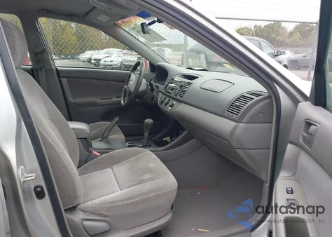 2002 Toyota Camry Le from USA, damaged, VIN 4T1BE32K22U573581